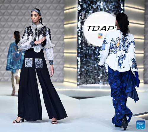Models present creations during a fashion show organized by The Trade Development Authority of Pakistan (TDAP) in southern Pakistani port city of Karachi on May 27, 2023.(Photo: Xinhua)