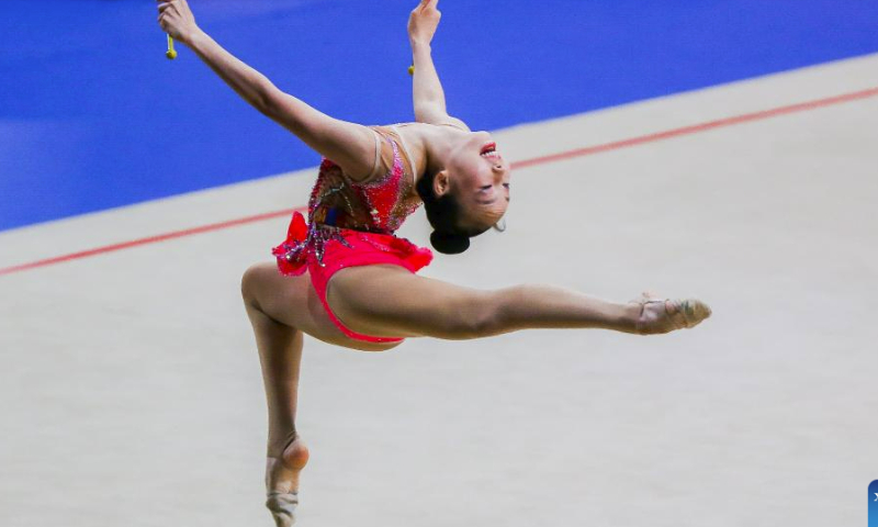 Urangoo Namkhaibayar of Mongolia competes during the clubs event of junior individual all-around final at the 14th Senior and 19th Junior Rhythmic Gymnastics Asian Championships in Manila, the Philippines, June 3, 2023. (Xinhua/Rouelle Umali)
