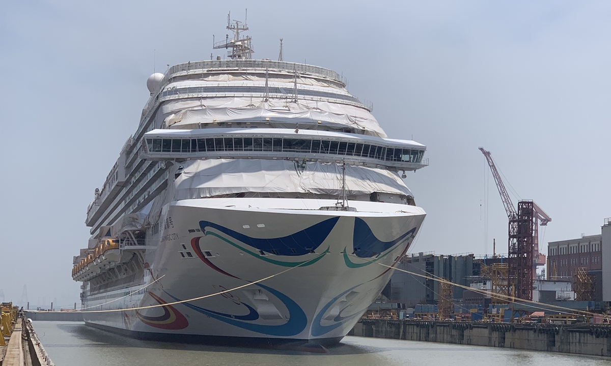 China's first domestically built large cruise ship Adora Magic City undergoes final preparations for the floating of the vessel by adding water into the assembly dock in a shipyard in Shanghai on June 1, 2023. The ship is scheduled to leave the dock on June 6, reflecting a breakthrough in China's shipbuilding industry, according to media reports. Photo: cnsphoto
