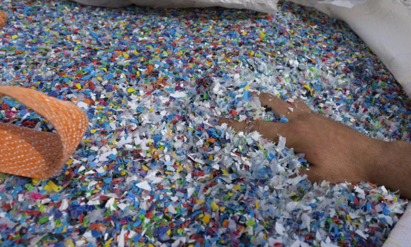 This photo taken on May 26, 2023 shows plastic packages at the facility of a plastic recycling company at west Athens, Greece. The World Environment Day 2023 will focus on beating plastic pollution and spotlight solutions to plastic pollution. (Photo by Lefteris Partsalis/Xinhua)