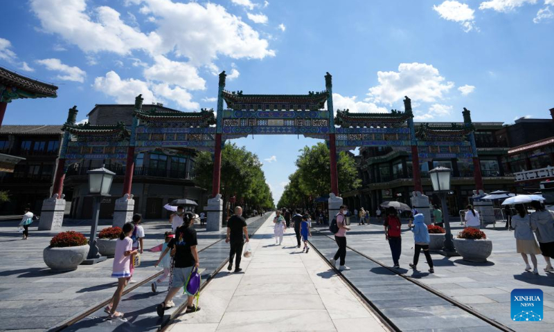People visit the Qianmen street in Beijing, capital of China, Aug. 16, 2022. Photo: Xinhua