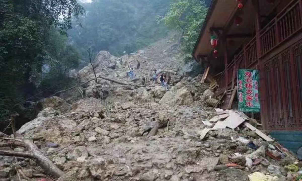 14 people were killed and five others are missing after a mountain collapsed at a state-owned forest farm in Leshan, Southwest China's Sichuan Province, local authorities said on Sunday, noting that search and rescue efforts are still underway. Photo: Sina Weibo 