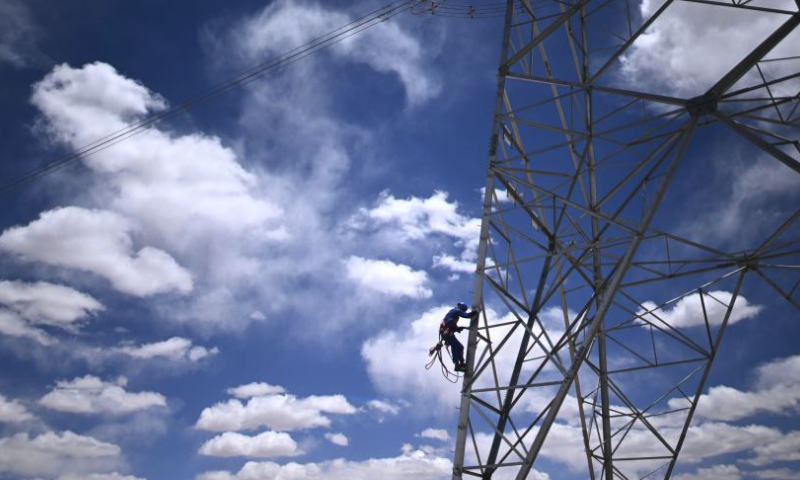 Workers conduct power grid maintenance work at Tanggulashan Township of Golmud City in the Mongolian-Tibetan Autonomous Prefecture of Haixi, northwest China's Qinghai Province, June 3, 2023. Since 2012, the State Grid's Qinghai Electricity Power Company would conduct its annual centralized maintenance of the Qinghai-Tibet grid interconnection project, whose grid lines are laid at the plateau with an average altitude of 4,500 meters. Low temperatures, lack of oxygen and strong winds on the plateau challenge the operation and maintenance of the grid.

Over 420 workers would finish this year's maintenance work of 608-kilometer-long power transmission lines as well as the Qaidam Converter Station in 15 days recently.

Over 10.5 billion kWh of electricity has been transferred to Tibet through the Qinghai-Tibet grid interconnection project, which was put into operation in 2011. (Xinhua/Zhang Hongxiang)