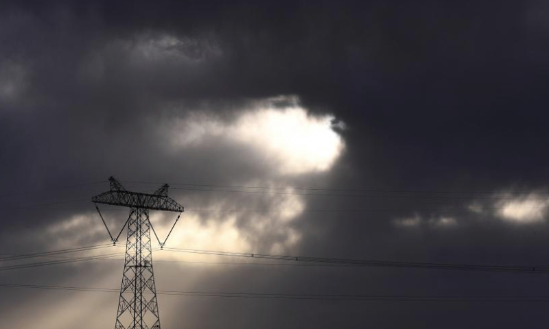 This photo taken on June 2, 2023 shows a power transmission tower in Hoh Xil of northwest China's Qinghai Province. Since 2012, the State Grid's Qinghai Electricity Power Company would conduct its annual centralized maintenance of the Qinghai-Tibet grid interconnection project, whose grid lines are laid at the plateau with an average altitude of 4,500 meters. Low temperatures, lack of oxygen and strong winds on the plateau challenge the operation and maintenance of the grid.

Over 420 workers would finish this year's maintenance work of 608-kilometer-long power transmission lines as well as the Qaidam Converter Station in 15 days recently.

Over 10.5 billion kWh of electricity has been transferred to Tibet through the Qinghai-Tibet grid interconnection project, which was put into operation in 2011. (Xinhua/Zhang Hongxiang)