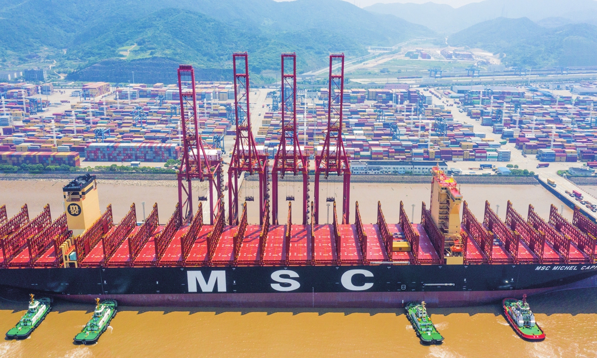 The Chuanshan area of Ningbo-Zhoushan Port in East China's Zhejiang Province welcomes an ultra-large container ship named MSC MICHEL CAPPELLIN, which has a maximum capacity of 24,346 TEUs, on June 2, 2023. It is the first stop for the home-made ship after it was officially put into operation, making its maiden voyage on the European route. Photo: VCG