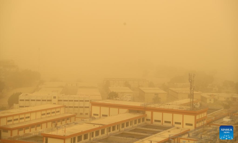 This photo taken on June 1, 2023 shows buildings shrouded in sand and dust during a sandstorm in Cairo, Egypt. A strong sandstorm hit the Egyptian capital city on Thursday afternoon.(Photo: Xinhua)