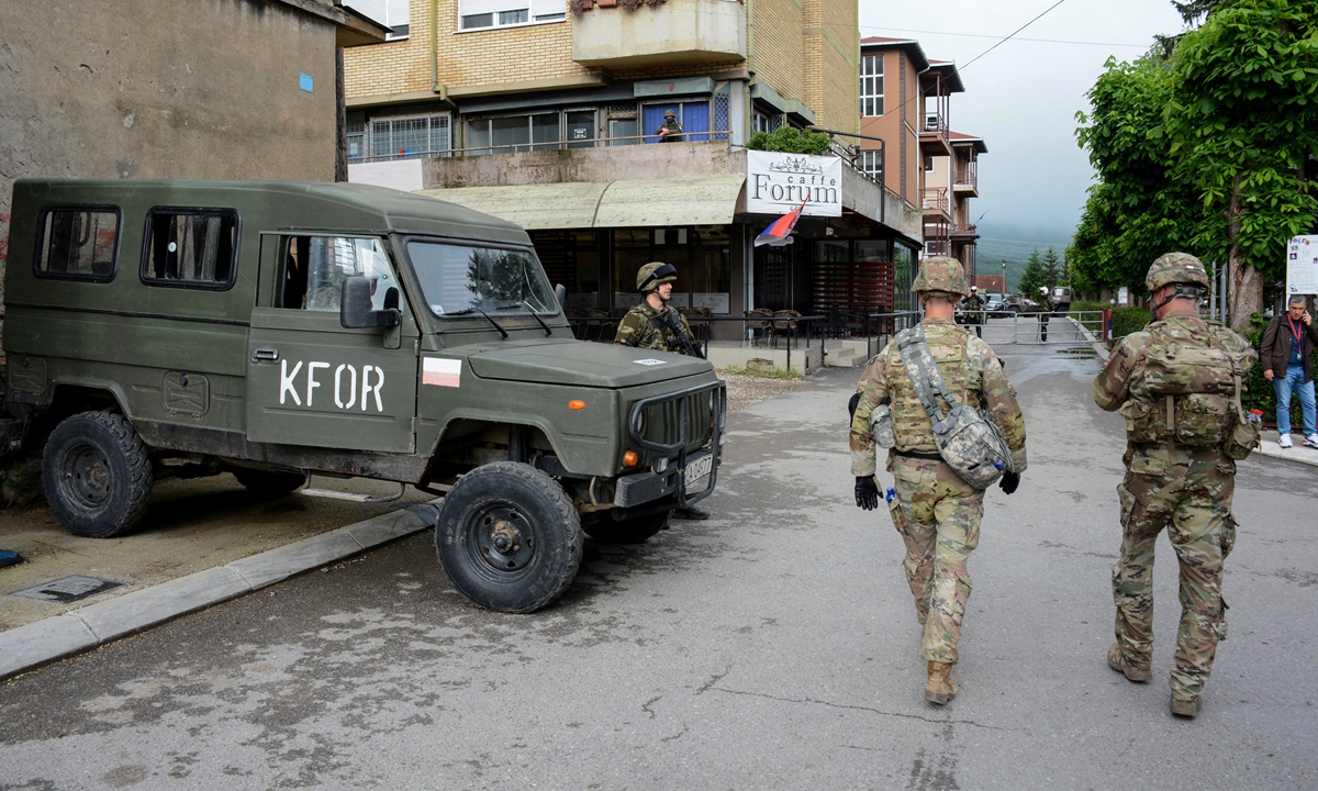 NATO soldiers patrol the streets in Zvecan, northern Kosovo on June 1, 2023. Photo: AFP