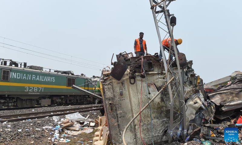 Rescuers work at the site of a train collision in Balasore district in the eastern Indian state of Odisha, June 3, 2023.(Xinhua/Javed Dar)