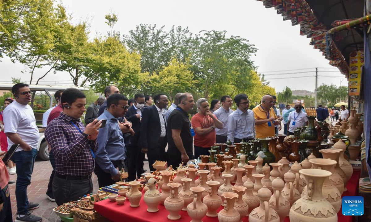 A delegation of diplomats and officials from the Arab League and its Secretariat visit the old town of Kashgar in northwest China's Xinjiang Uygur Autonomous Region, May 31, 2023. After attending the 18th senior officials' meeting and the 7th senior official-level strategic political dialogue of the China-Arab States Cooperation Forum, the 34-member group visited northwest China's Xinjiang Uygur Autonomous Region from Tuesday to Friday. Photo:Xinhua/Gao Han