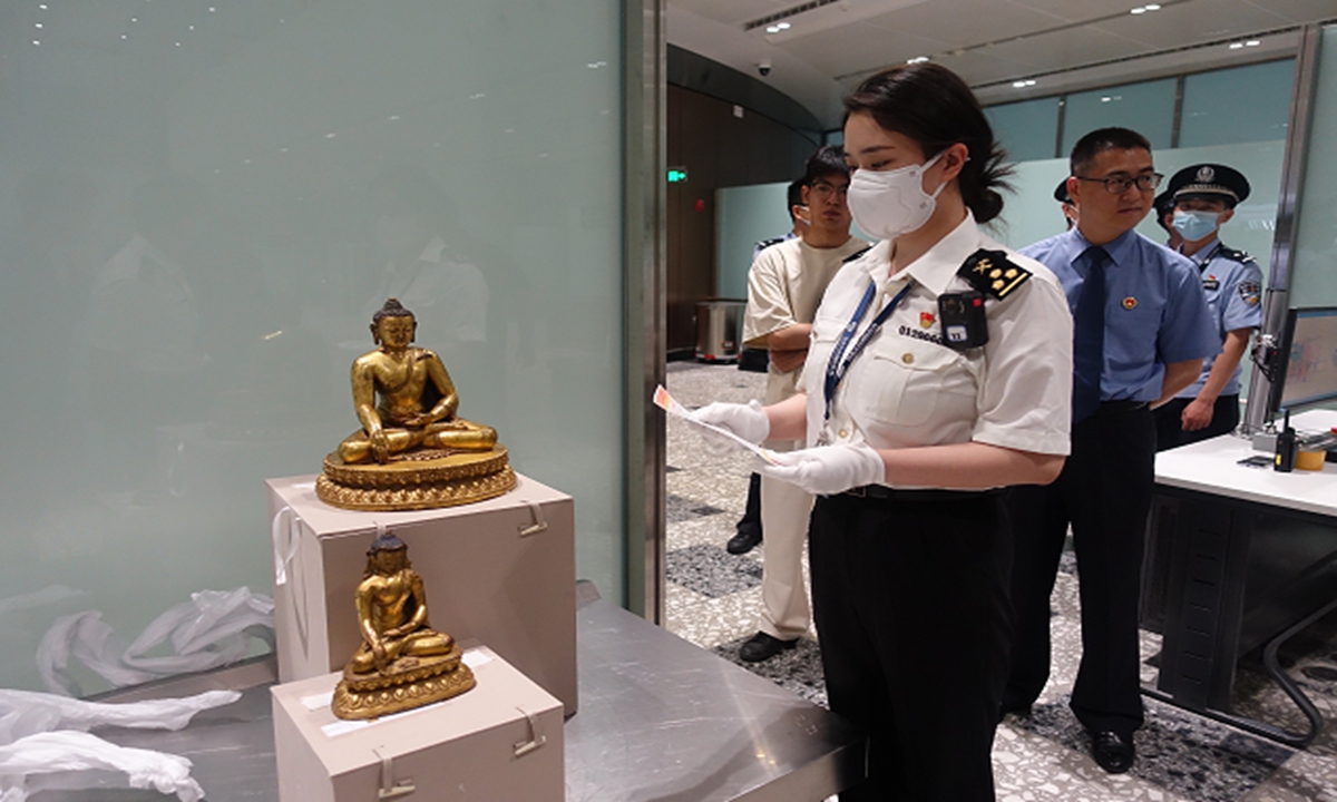 The Anti-Smuggling Bureau of the Beijing Customs has successfully recovered two valuable Buddhist statues from the Ming Dynasty that were illicitly taken out of the Chinese mainland. Photo: The Beijing Customs
