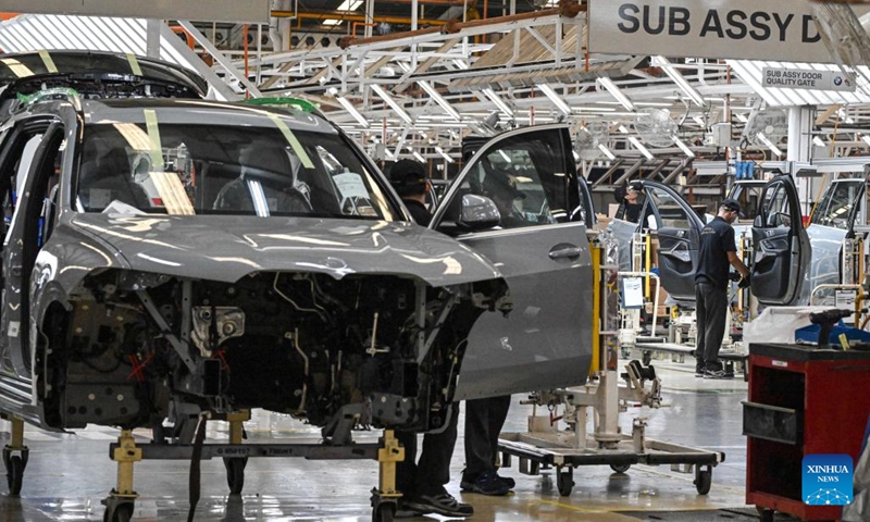 Workers assemble a BMW car at Gaya Motor Plant in Jakarta, Indonesia, June 6, 2023.(Photo: Xinhua)