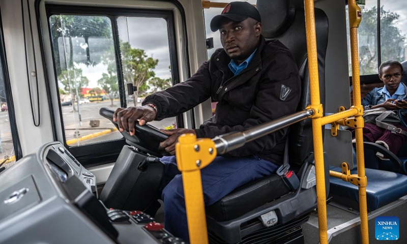 A driver from BasiGo drives an electric bus in Nairobi, Kenya, on June 3, 2023. The World Environment Day falls on June 5. In order to cope with climate change and protect the ecological environment, Kenya has made great efforts to promote the operation of electric buses and has introduced relevant policies to promote emission reduction.(Photo: Xinhua)