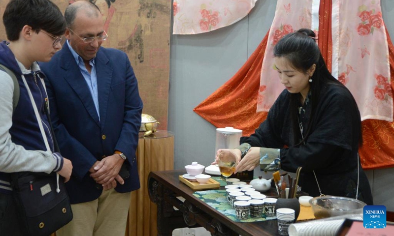 People wait to taste Chinese tea at the Ancient Tea with New Glamour exhibition in Valletta, Malta, on June 6, 2023. An exhibition showcasing the tea culture of Xi'an, Shaanxi Province in northwest China, commenced on Tuesday at the China Cultural Centre in Malta.(Photo: Xinhua)