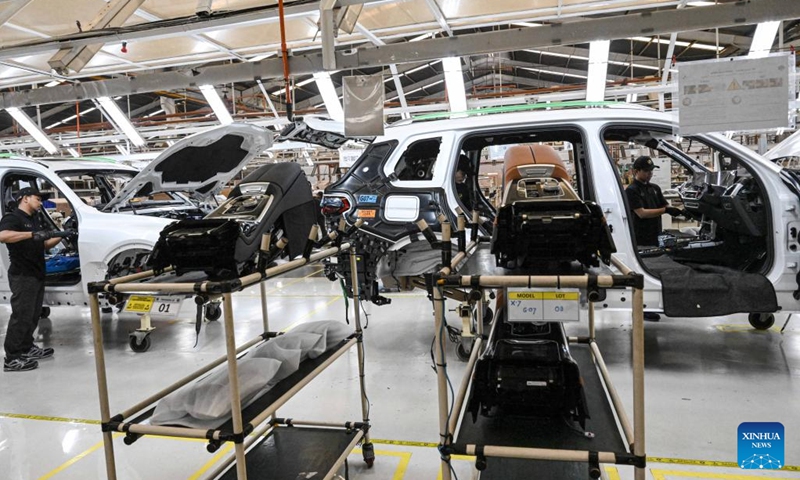 Workers assemble a BMW car at Gaya Motor Plant in Jakarta, Indonesia, June 6, 2023.(Photo: Xinhua)