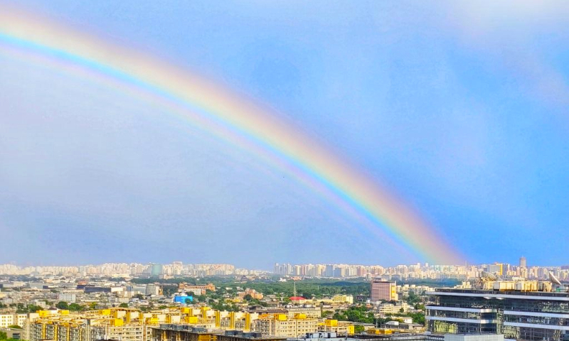 This photo taken with a mobile phone shows a rainbow in the sky over Beijing, capital of China, June 11, 2023. (Xinhua/Xu Jinquan)
