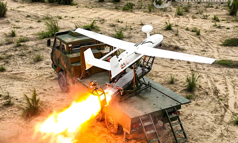 An unmanned aerial vehicle (UAV) attached to a brigade under the PLA 82nd Group Army is launched for a recent flight training exercise. (eng.chinamil.com.cn/Photo by Liu Kui)