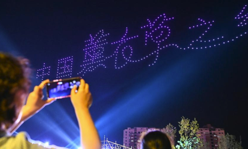 Tourists watch a drone performance at a park in Huocheng County, northwest China's Xinjiang Uygur Autonomous Region, June 16, 2023. Swathes of beautiful lavender is luring a large number of tourists to Huocheng County.

An international lavender tourism festival kicked off in Huocheng on June 15. (Xinhua/Ding Lei)