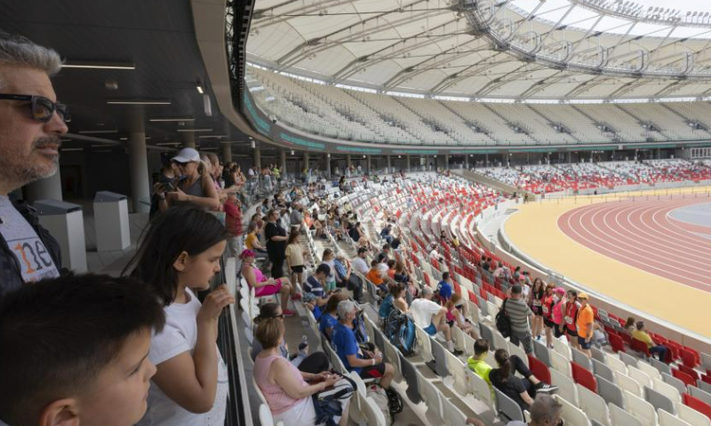 People participate in a family day event in the newly opened National Athletics Centre in Budapest, Hungary on June 17, 2023. The brand new National Athletics Centre will host 2023 World Athletics Championships during August 19-27. (Photo by Attila Volgyi/Xinhua)