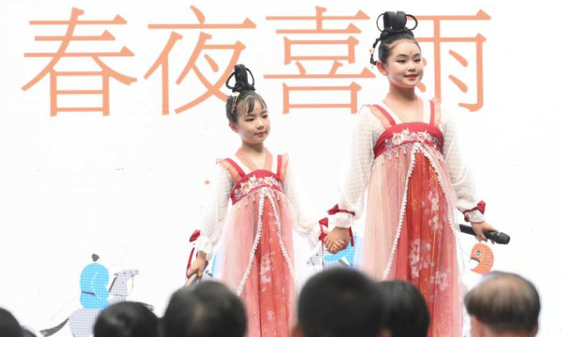 Children perform during a series of activities to celebrate the International Children's Day in Chengdu, southwest China's Sichuan Province, May 31, 2023. Chengdu, a historical city in southwest China's Sichuan Province, is home to treasured cultural and historical sites, including Sanxingdui Ruins, Jinsha Site Museum, and Dujiangyan irrigation system. In recent years, Chengdu has witnessed the rapid development of its cultural and creative industry, showcasing its vitality, creativeness and energy. (Xinhua)