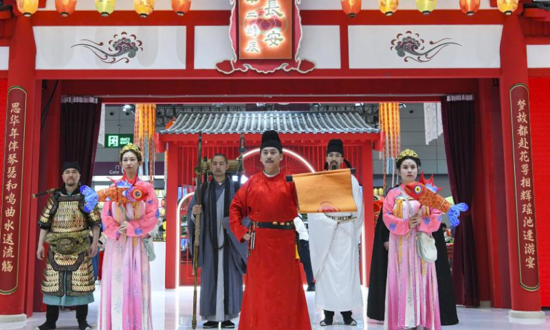 Staff members in ancient costumes at China's Shaanxi booth welcome visitors during the 19th China (Shenzhen) International Cultural Industries Fair in Shenzhen, south China's Guangdong Province, June 9, 2023. The 19th China (Shenzhen) International Cultural Industries Fair kicked off here on Wednesday, which is expected to inject new impetus into the development of the country's cultural industry. Over 300 exhibitors from more than 50 countries and regions have registered to display their distinctive products in the fair's Belt and Road International Exhibition Area. (Xinhua/Liang Xu)