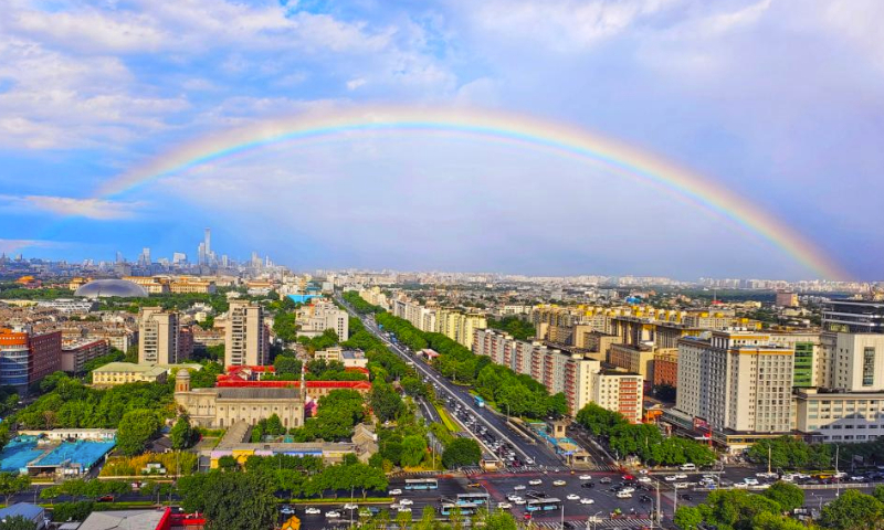 This photo taken with a mobile phone shows a rainbow in the sky over Beijing, capital of China, June 11, 2023. (Xinhua/Xu Jinquan)