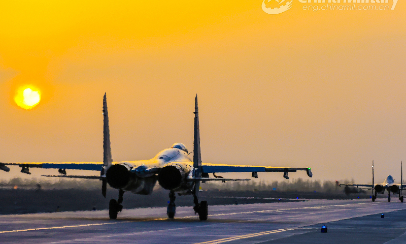 Fighter jets attached to a brigade under the PLA Air Force Xi'an Flying College taxi on the runway during a round-the-clock training mission in early June, 2023. (eng.chinamil.com.cn/Photo by Cui Baoliang)