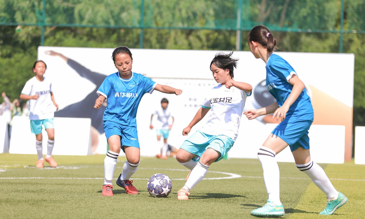 Girls play soccer at a charity match on June 5, 2023 in Beijing. Photo: Courtesy of organizers