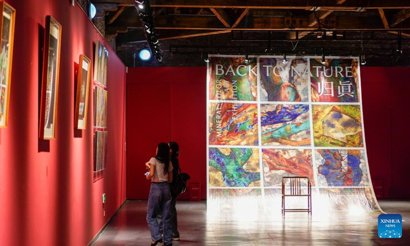 Tourists visit an exhibition at a museum displaying the history of Palace Museum antiques moved there during World War II in southwest China's Chongqing, June 9, 2023. The museum is located in a former foreign firm, where nearly 4,000 cases of antiques were stored during wartime. The items from the Palace Museum, also known as the Forbidden City, were moved to Chongqing in late 1930s when Japanese troops invaded Beijing.(Photo: Xinhua)