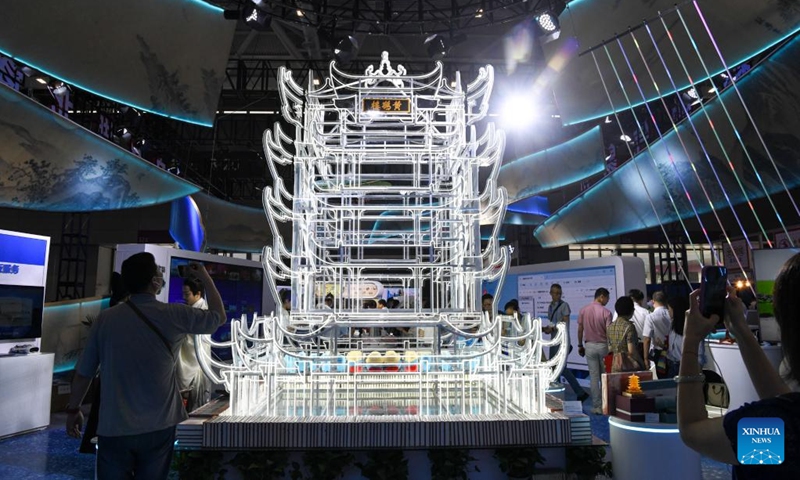 People visit the 19th China (Shenzhen) International Cultural Industries Fair in Shenzhen, south China's Guangdong Province, June 7, 2023. The 19th China (Shenzhen) International Cultural Industries Fair kicked off here on Wednesday, which is expected to inject new impetus into the development of the country's cultural industry. The five-day national-level fair, featuring mainly offline events, has attracted more than 3,500 government bodies, cultural organizations and enterprises. (Photo: Xinhua)