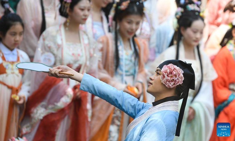 A performance is staged during a cultural event in Xixi Wetland in Hangzhou, capital of east China's Zhejiang Province, April 2, 2023. Hangzhou with its rich cultural heritage and breathtaking natural beauty has established itself as a must-visit city for travel enthusiasts.(Photo: Xinhua)