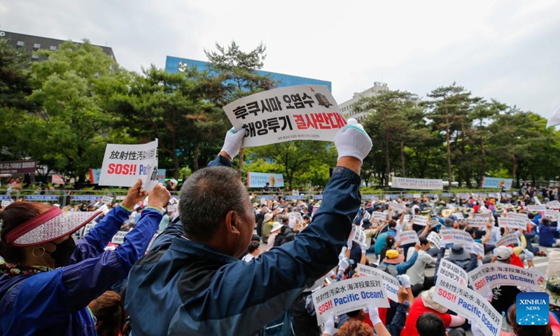 People rally to protest against Japan's planned discharge of radioactive wastewater in Seoul, South Korea, June 12, 2023. Thousands of South Korean fishermen gathered on Monday near the parliamentary building in Seoul to clamor against Japan's planned discharge of radioactive wastewater from its crippled Fukushima Daiichi nuclear power plant into the Pacific Ocean(Photo: Xinhua)