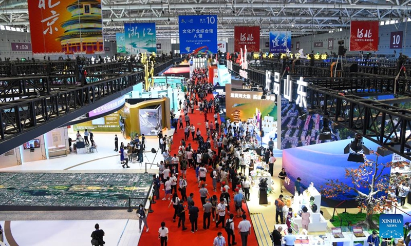 People visit the 19th China (Shenzhen) International Cultural Industries Fair in Shenzhen, south China's Guangdong Province, June 7, 2023. The 19th China (Shenzhen) International Cultural Industries Fair kicked off here on Wednesday, which is expected to inject new impetus into the development of the country's cultural industry. The five-day national-level fair, featuring mainly offline events, has attracted more than 3,500 government bodies, cultural organizations and enterprises.(Photo: Xinhua)