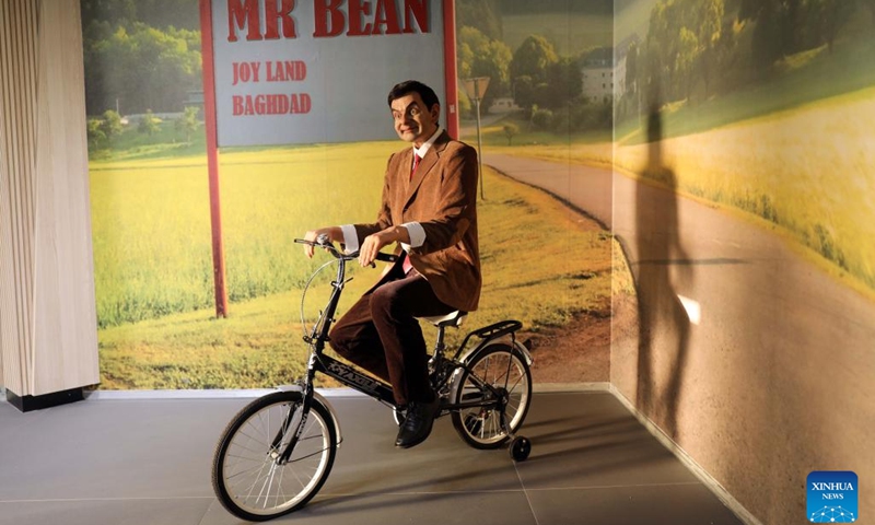 A wax statue of British comedian Rowan Atkinson as Mr. Bean is on display at the Wax Museum in Baghdad, Iraq, on June 13, 2023. For the first time in Iraq, wax statues of Iraqi and foreign art and sports figures were exhibited at the Wax Museum in Baghdad.(Photo: Xinhua)