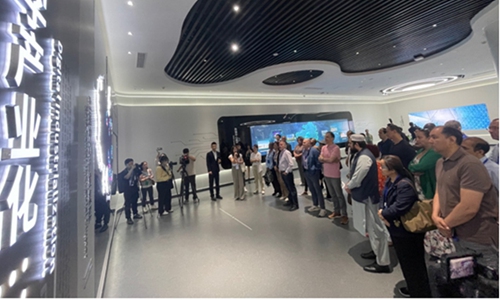 More than 20 diplomats from 19 nations and the Shanghai Cooperation Organization (SCO) visit the National Big Data Comprehensive Pilot Zone Exchange and Experience Center in Guiyang on June 4, 2023. Photo: Liu Caiyu/GT