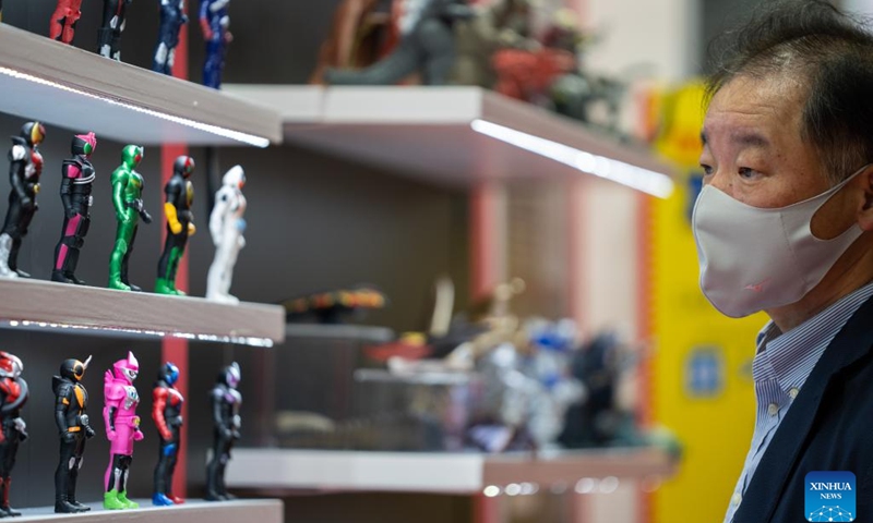 A visitor looks at toys exhibited at the International Tokyo Toy Show in Tokyo, Japan, June 8, 2023. The International Tokyo Toy Show, which runs from Thursday to Sunday, is expected to bring together 156 firms worldwide to exhibit their latest products to an estimated 90,000 visitors.(Photo: Xinhua)