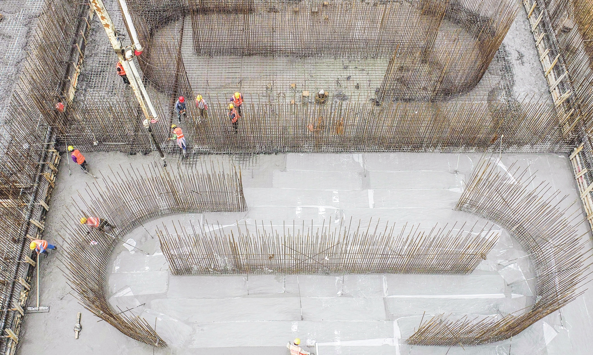 Workers are busy with photovoltaic (PV) cell construction in a company in Huai'an, East China's Jiangsu Province on June 12, 2023. Exports of China's PV products in the first four months of this year rose 18.9 percent year-on-year to $19.35 billion, official data showed. Photo: cnsphoto