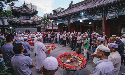 Muslims pray in the Eid al-Fitr celebration at the Niujie Mosque in Beijing. Photo: Li Hao/GT