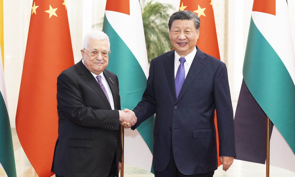 Chinese President Xi Jinping held talks with Palestinian President Mahmoud Abbas in Beijing on June 14. The two leaders announced the establishment of a strategic partnership between China and Palestine. Photo: Xinhua