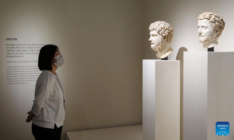 A visitor looks at exhibits during a media preview of an exhibition of ancient Greece and Rome art and culture at the National Museum of Korea in Seoul, South Korea, June 14, 2023. An exhibition of ancient Greece and Rome art and culture was announced on Wednesday at the National Museum of Korea. The exhibition is jointly organized with the Kunsthistorisches Museum in Vienna, Austria, which houses a world-renowned collection of Greek and Rome antiquities(Photo: Xinhua)