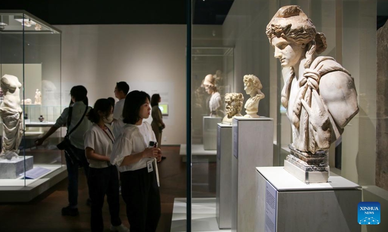 Visitors look at exhibits during a media preview of an exhibition of ancient Greece and Rome art and culture at the National Museum of Korea in Seoul, South Korea, June 14, 2023. An exhibition of ancient Greece and Rome art and culture was announced on Wednesday at the National Museum of Korea. The exhibition is jointly organized with the Kunsthistorisches Museum in Vienna, Austria, which houses a world-renowned collection of Greek and Rome antiquities. (Photo: Xinhua)