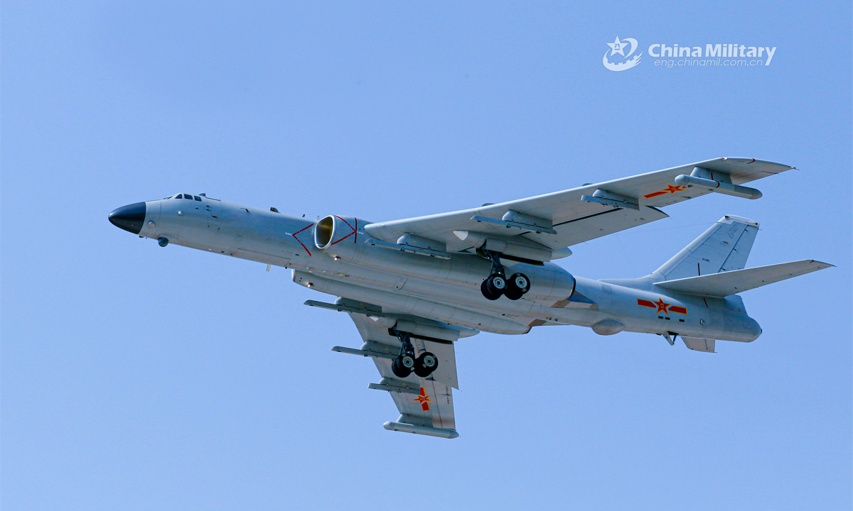 A bomber attached to an aviation regiment of the air force under the PLA Southern Theater Command glides through the sky during a recent round-the-clock flight training exercise. (eng.chinamil.com.cn/Photo by Chen Yanan)