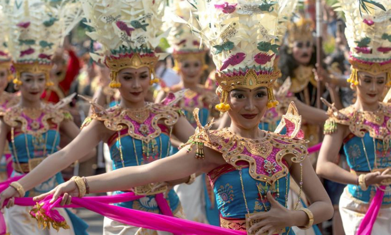 Performers participate in the opening of the 45th Bali Arts Festival in Denpasar, Bali, Indonesia, on June 18, 2023. (Photo by Dicky Bisinglasi/Xinhua)