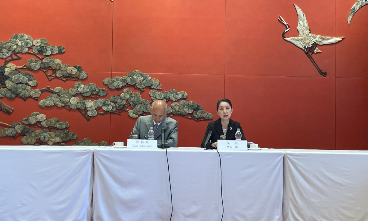 Wu Xi, director-general of the Department of Consular Affairs of the Foreign Ministry (right), speaks at a press briefing in Beijing on June 21. Photo: Wang Qi/GT