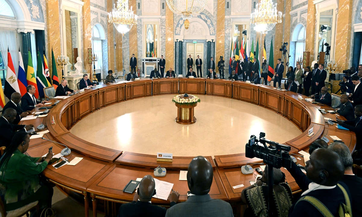 Russian President Vladimir Putin (left) attends a meeting with delegations of African leaders at the Konstantinovsky Palace, outside Saint Petersburg, on June 17, 2023. Putin said he welcomed what he called 