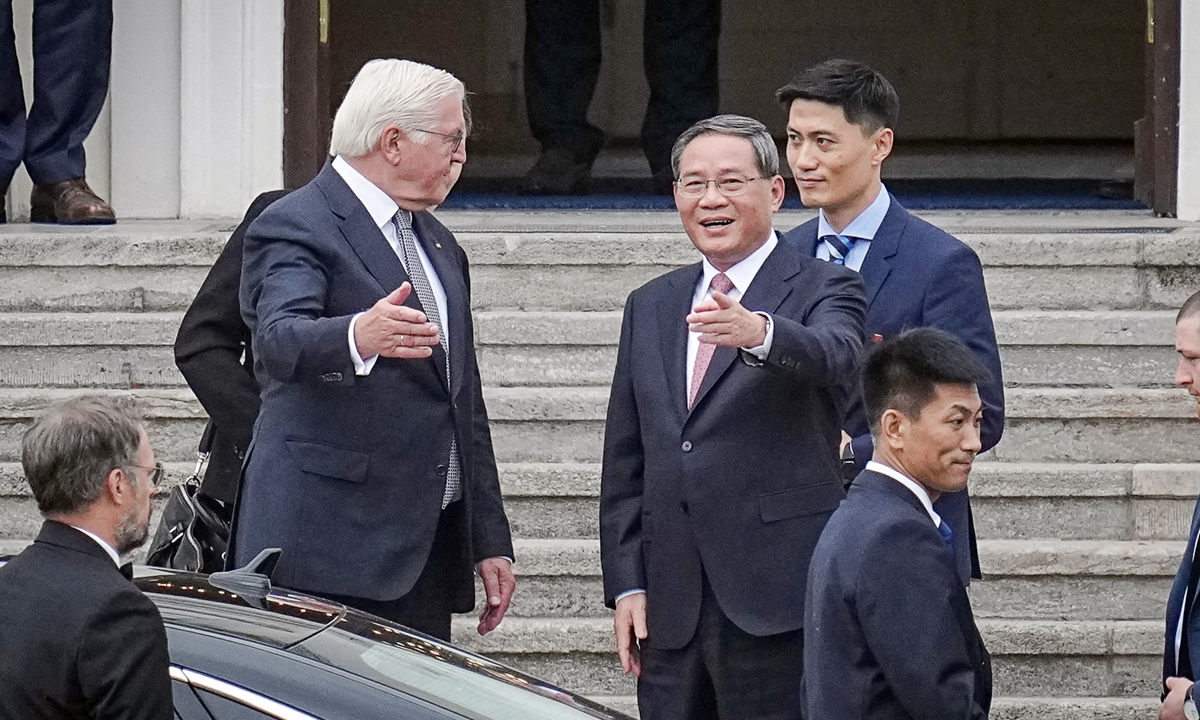 German President Frank-Walter Steinmeier (left) bids farewell to visiting Chinese Premier Li Qiang (center right) in front of Bellevue Palace after their meeting in Berlin on June 19, 2023.The Chinese premier will also co-chair the seventh China-Germany inter-governmental consultation during the visit. Photo: VCG