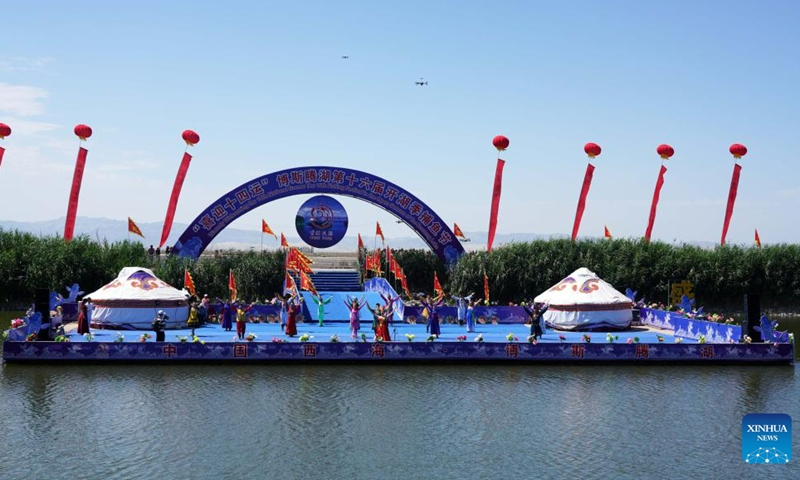 A performance is staged during the 16th Fishing Festival in the Open Season of Bosten Lake in Bohu County, northwest China's Xinjiang Uygur Autonomous Region, June 23, 2023. Photo: Xinhua