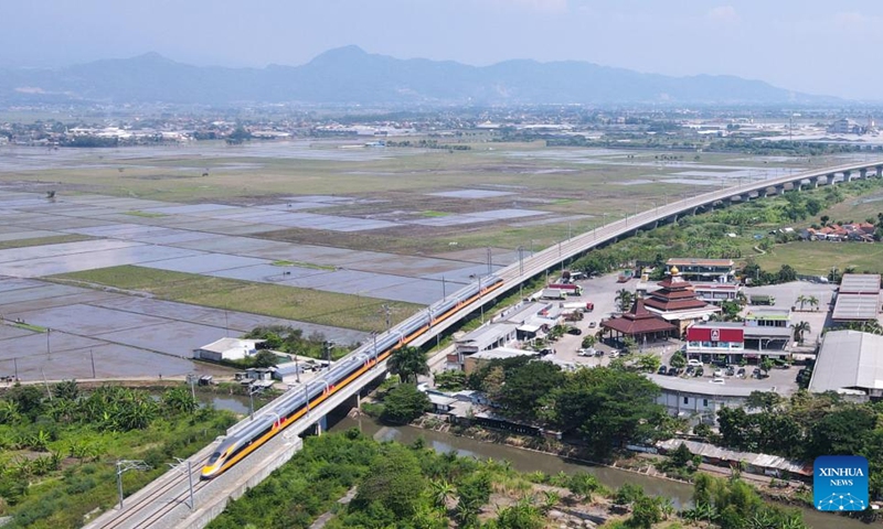 This aerial photo taken on June 22, 2023 shows a comprehensive inspection train running along the Jakarta-Bandung High-Speed Railway in Bandung, Indonesia. The comprehensive inspection train (CIT) of Jakarta-Bandung High-Speed Railway (HSR) reached 350 km per hour, the design speed, for the first time on Thursday during the joint commissioning and testing phase. (Xinhua/Xu Qin) 