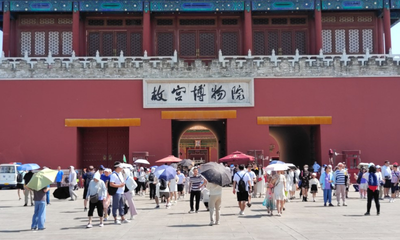 Tourists visit the Palace Museum in Beijing on high temperature day of 40 C on June 24, 2023. Photo: IC