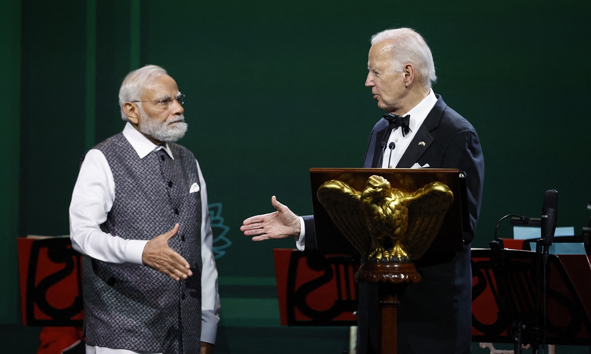 US President Joe Biden (R) and Indian Prime Minister Narendra Modi (L) shake hands during a state dinner at the White House on June 22, 2023 in Washington, DC.Photo:AFP