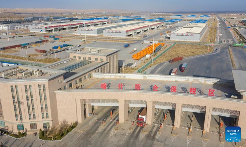 This aerial photo shows a view of the comprehensive bonded zone in Kashgar, northwest China's Xinjiang Uygur Autonomous Region, March 9, 2023. (Xinhua/Hu Huhu)